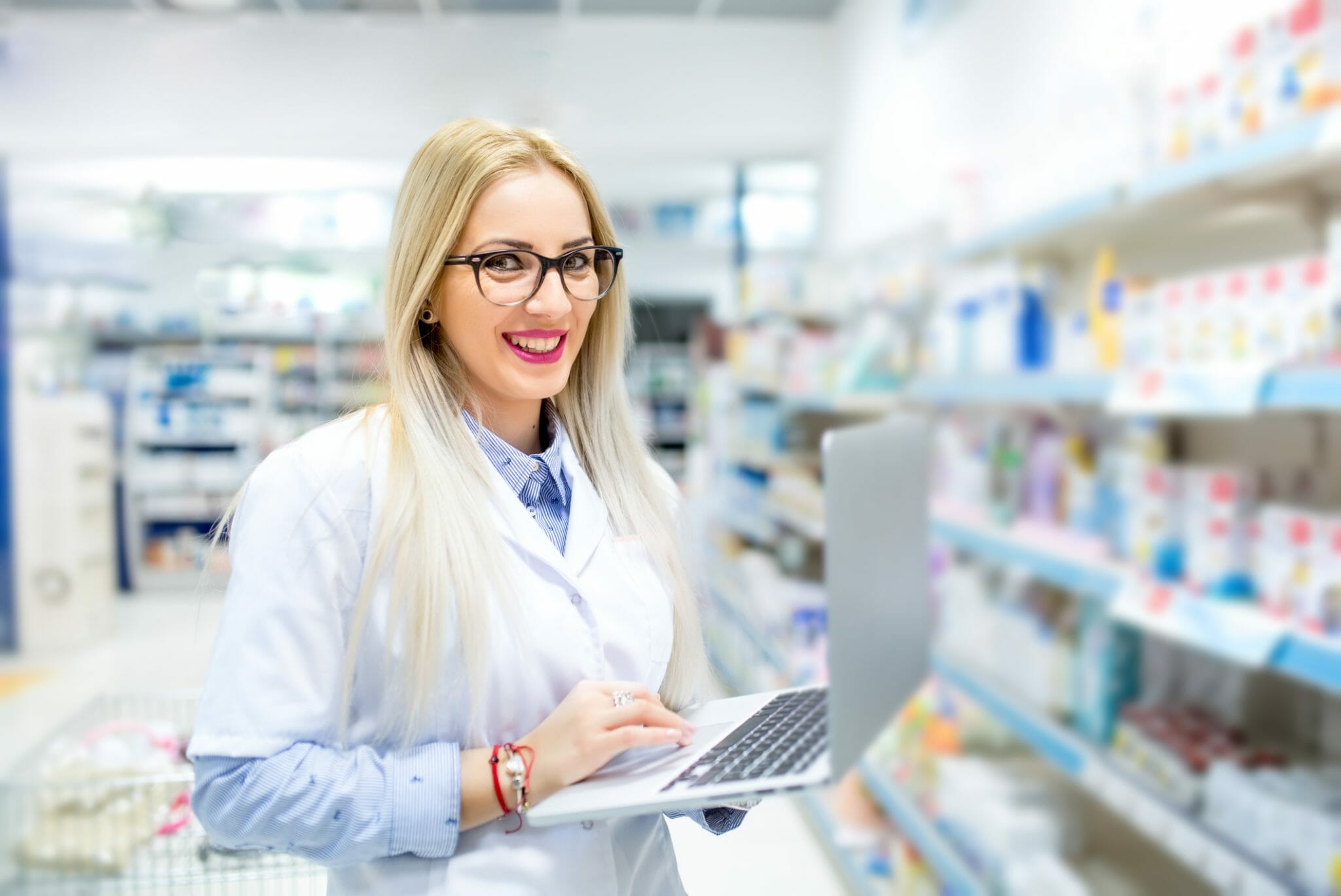 Medical researcher and pharmaceutical scientist using laptop and internet for business