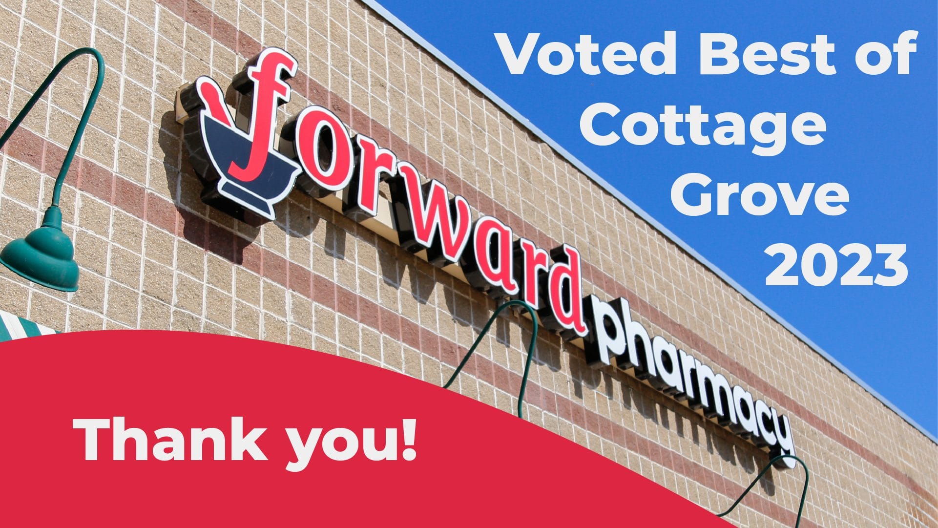 Forward Pharmacy sign on a brick wall, with "Voted Best of Cottage Grove 2023" and a red "Thank you!" banner.