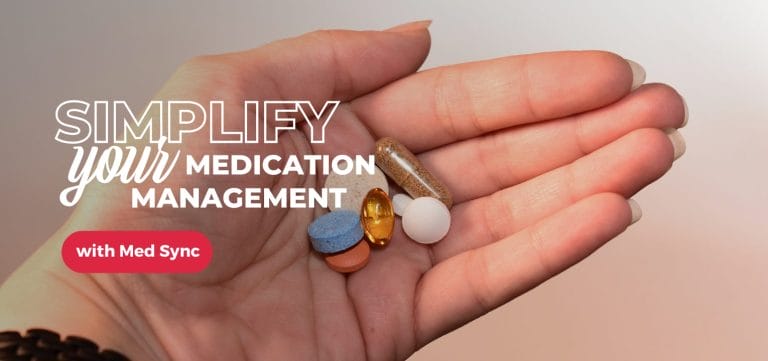 A hand holds various colorful pills against a soft gradient background, promoting medication management with Med Sync.